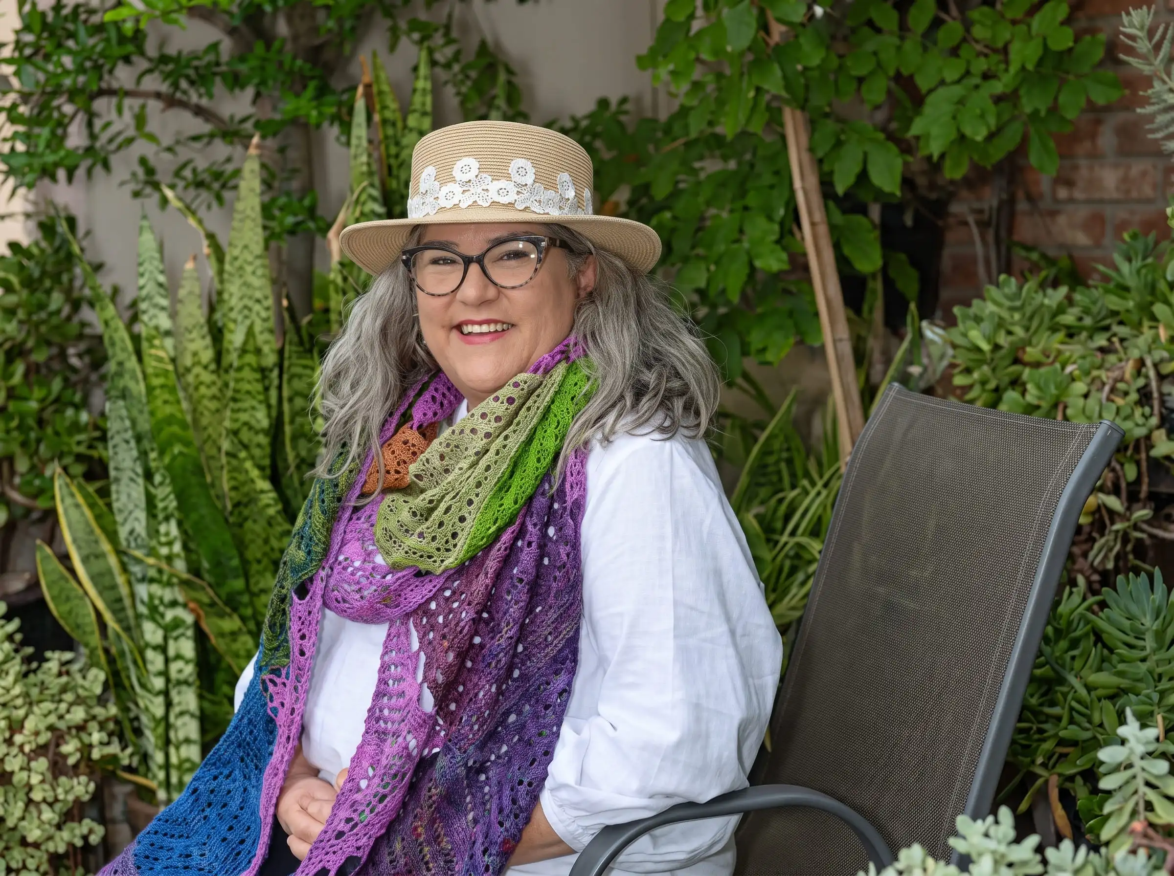 Kathy wearing the Leura Blossoms shawl